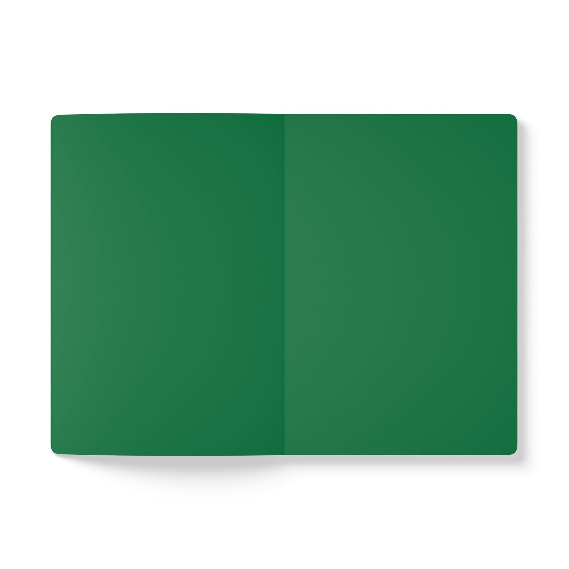 An open African-inspired journal lies flat on a white surface. Both visible pages are completely blank and solid dark green in color, with a subtle crease running vertically down the center where the notebook is folded.