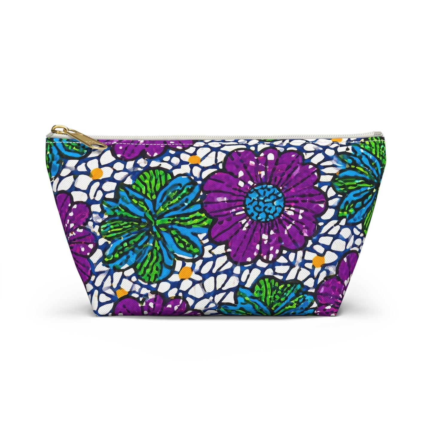 A rectangular zippered pouch with a bold, African-inspired floral pattern. The design features large purple flowers, green and blue leaves, and mosaic-like shapes on white. This T-bottom cosmetic travel bag stands upright with a gold-colored zipper.