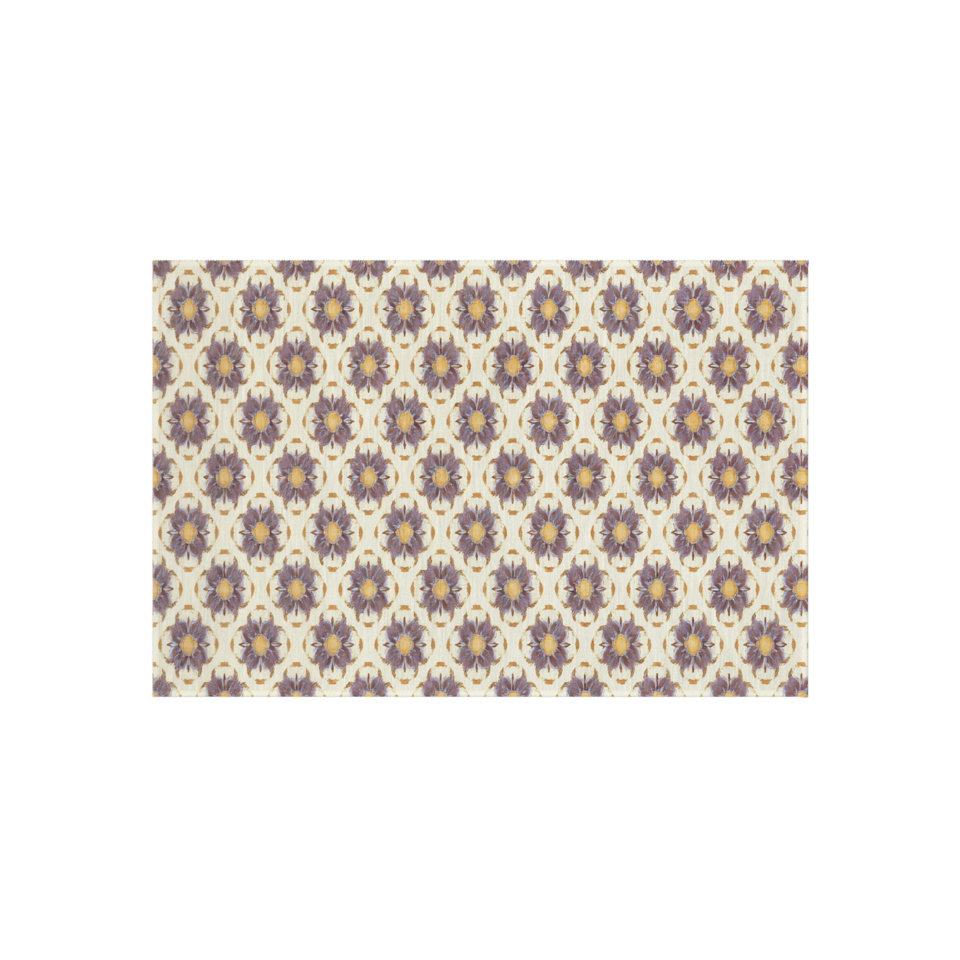 A rectangular tile features a repeating, African-inspired floral pattern with purple, blue, and yellow flowers, each surrounded by brown accents on a cream-colored background. The design forms a symmetrical, interlocking motif across the entire tile.