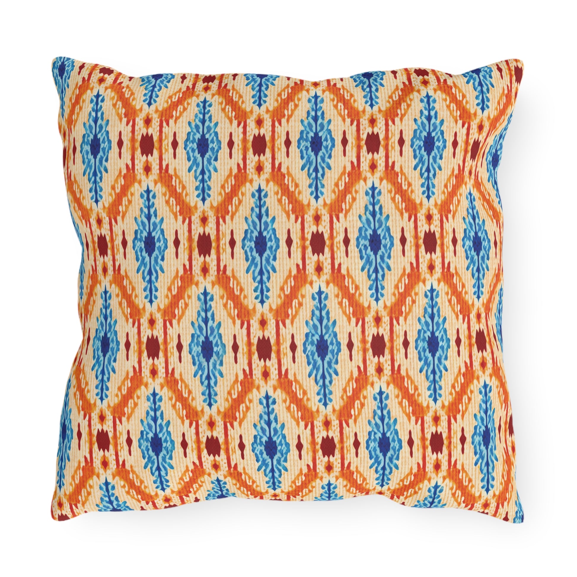 Square outdoor pillow with a colorful geometric and floral pattern featuring orange, blue, and red designs on a beige background. UV-resistant and water-resistant, this vibrant cushion is perfect for adding decorative flair to your outdoor space.