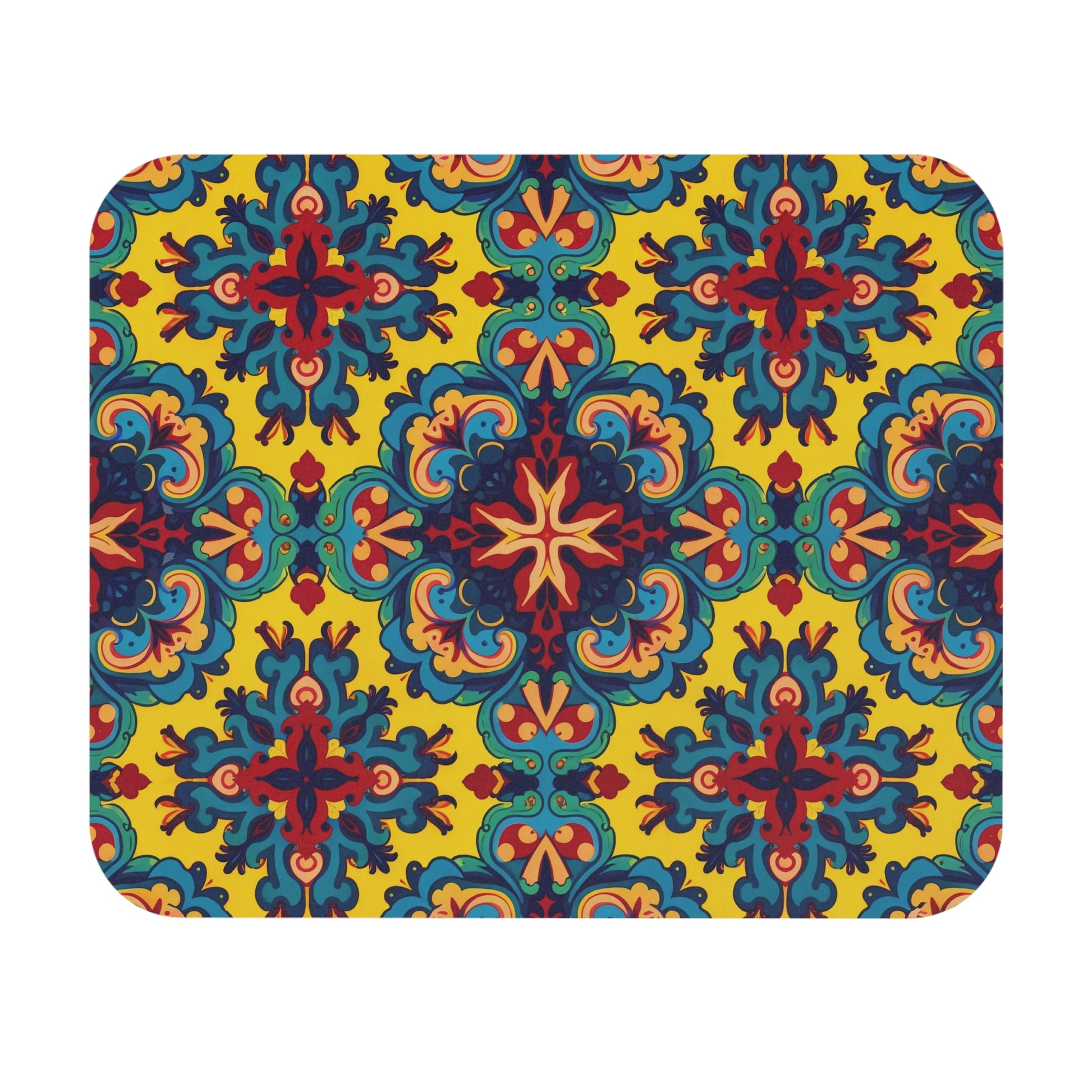 A rectangular mat with rounded corners featuring a vibrant, symmetrical pattern. This African-inspired mouse pad displays blue, red, and orange ornate shapes on bright yellow, with a non-slip rubber base for a stylish and creative desk accessory.