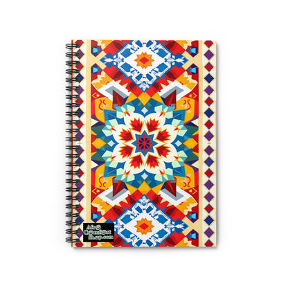 A spiral-bound notebook with a colorful geometric cover showcases culturally inspired designs in blue, red, yellow, and white. The bottom left corner displays a small green and white Alex Comfort Shop.com logo.
