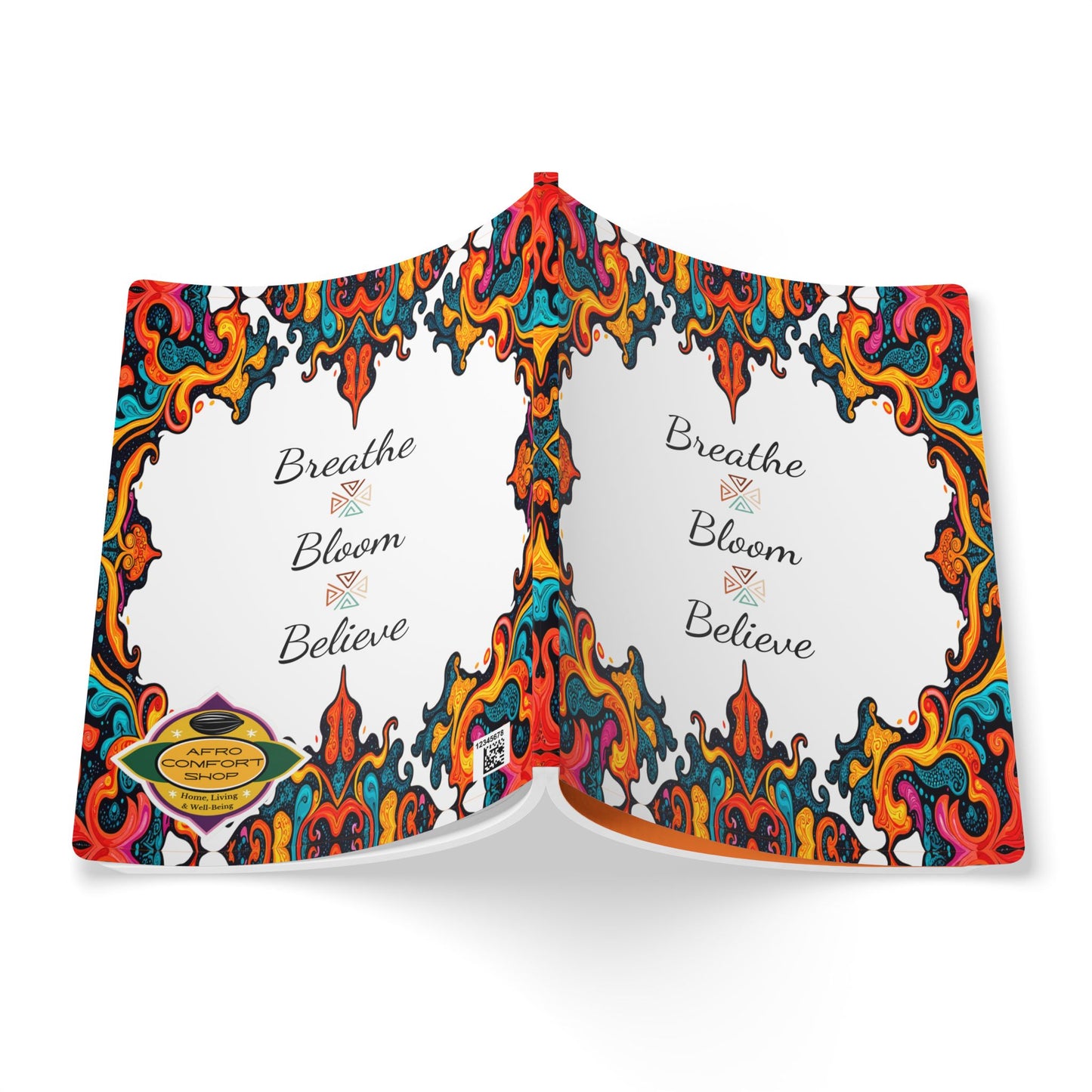 An open creative journal with a colorful, swirling abstract border in red, orange, blue, and yellow. The center pages say “Breathe, Bloom, Believe” in elegant script. A gold Carbon Neutral badge is on the bottom left corner of the cover.