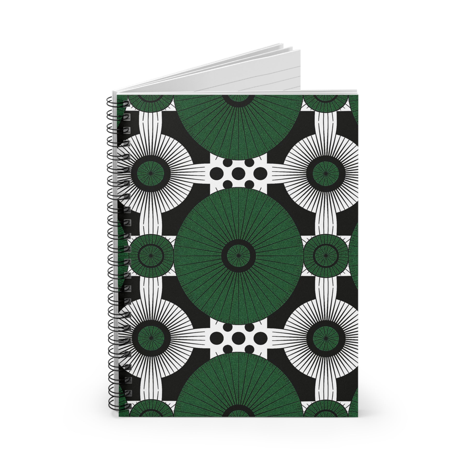 An African-inspired spiral notebook with a cover featuring large green and black circular shapes, radiating white lines, and black polka dots on white. The abstract geometric pattern offers a premium writing experience with culturally inspired designs.