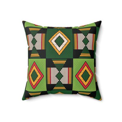 A vibrant African accent pillow, this square faux suede pillow features green, black, yellow, and orange diamond shapes and vertical stripes on a white background, arranged in alternating squares for a bold geometric look.