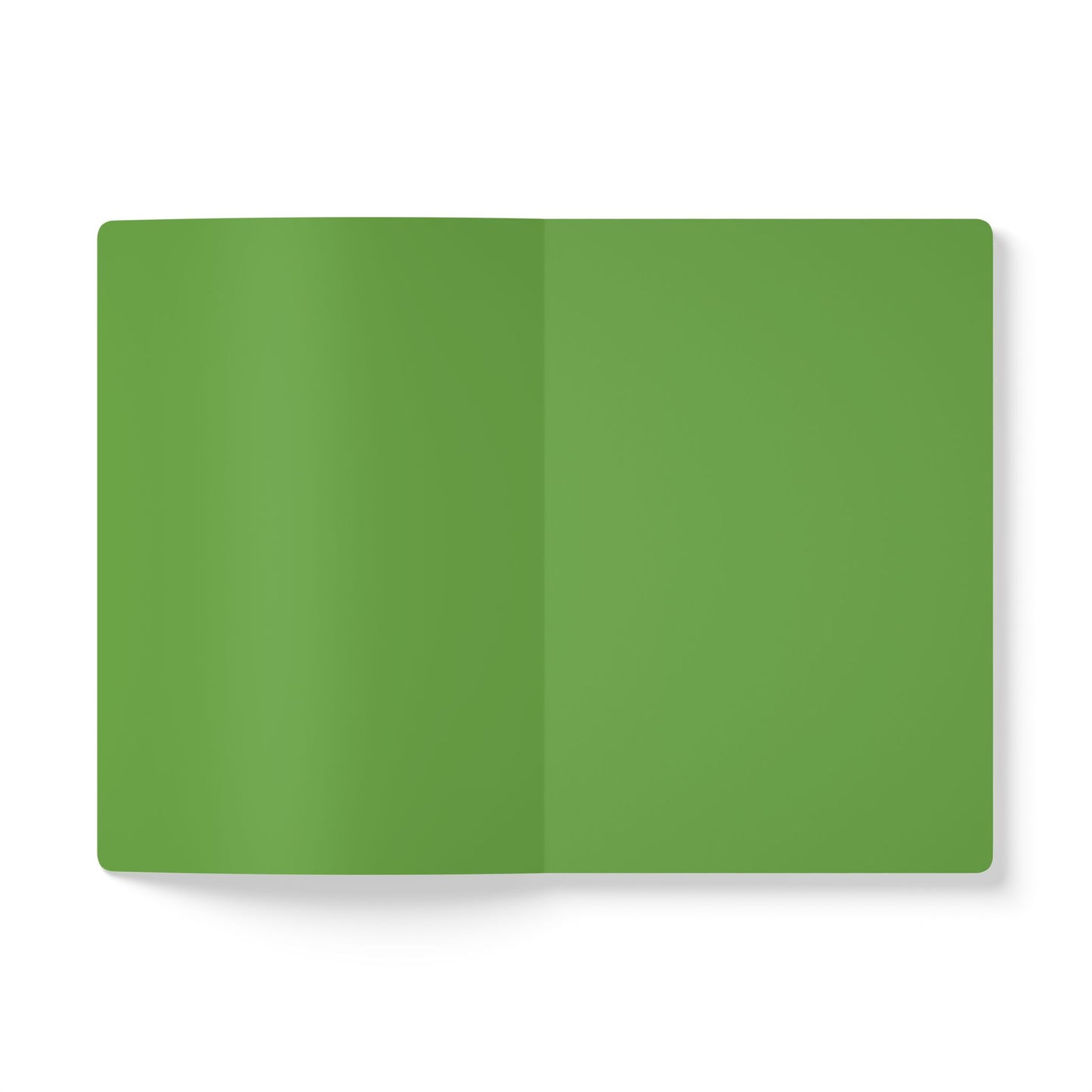 A top-down view of an open African-inspired journal or notebook with blank, solid green pages. The background is white, and there are no visible text, images, or markings. The shadows suggest a slight curve at the book’s spine.
