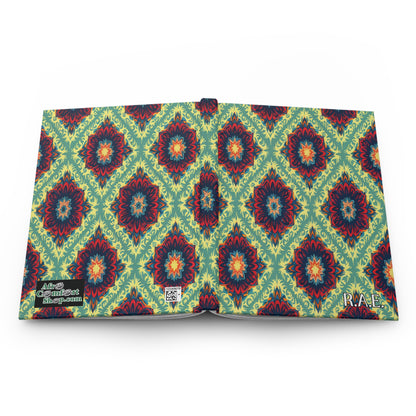 An open African-inspired personalized journal displays a vibrant cover with a repeating geometric floral pattern in red, teal, yellow, and navy on light green. The bottom corners feature labels: “Alice Colossarte Bibliotheca” and “R.A.E.”.