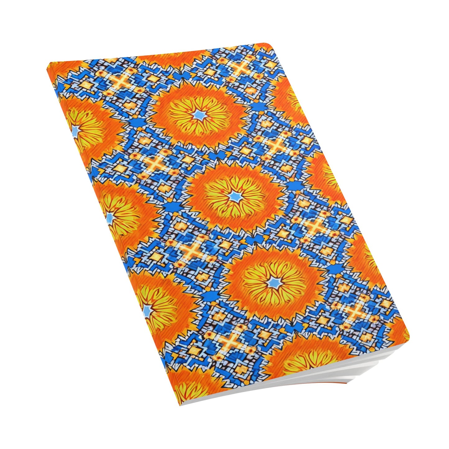 A creative journal with a vibrant cover featuring a symmetrical pattern of orange and yellow sunburst shapes, blue geometric details, and white star-like accents. The African-inspired journal is closed and photographed at an angle against a white background.