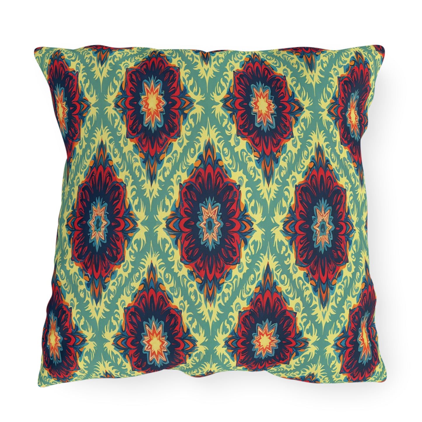 Square pillow with a vibrant, African-inspired geometric pattern featuring symmetrical floral medallions in red, navy, yellow, and green. The light green background with yellow leafy shapes forms a repeating diamond design across the fabric.