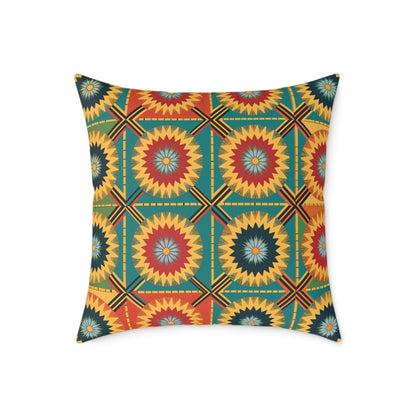 Square pillow with a vibrant geometric pattern featuring sunburst shapes in red, yellow, and blue-green, arranged in a symmetrical grid. This African-inspired pillow adds colorful home decor flair with yellow borders and bold accents on a green background.