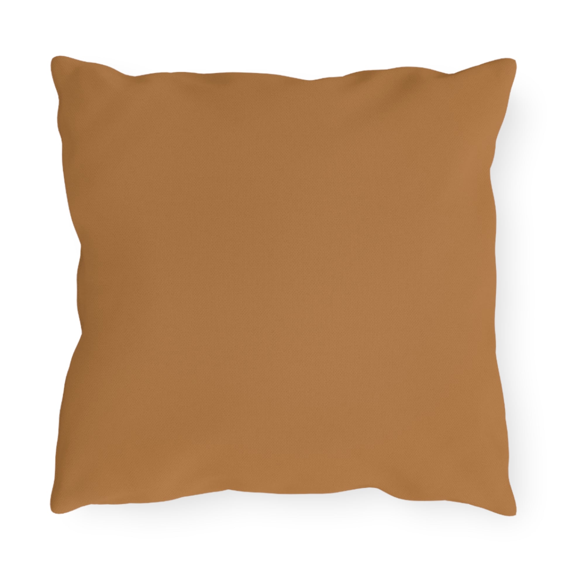A square throw pillow with a smooth, solid caramel brown cover, displayed against a white background. Subtle creases and plush filling offer comfort, while the rich hue brings an African-inspired warmth to any space.