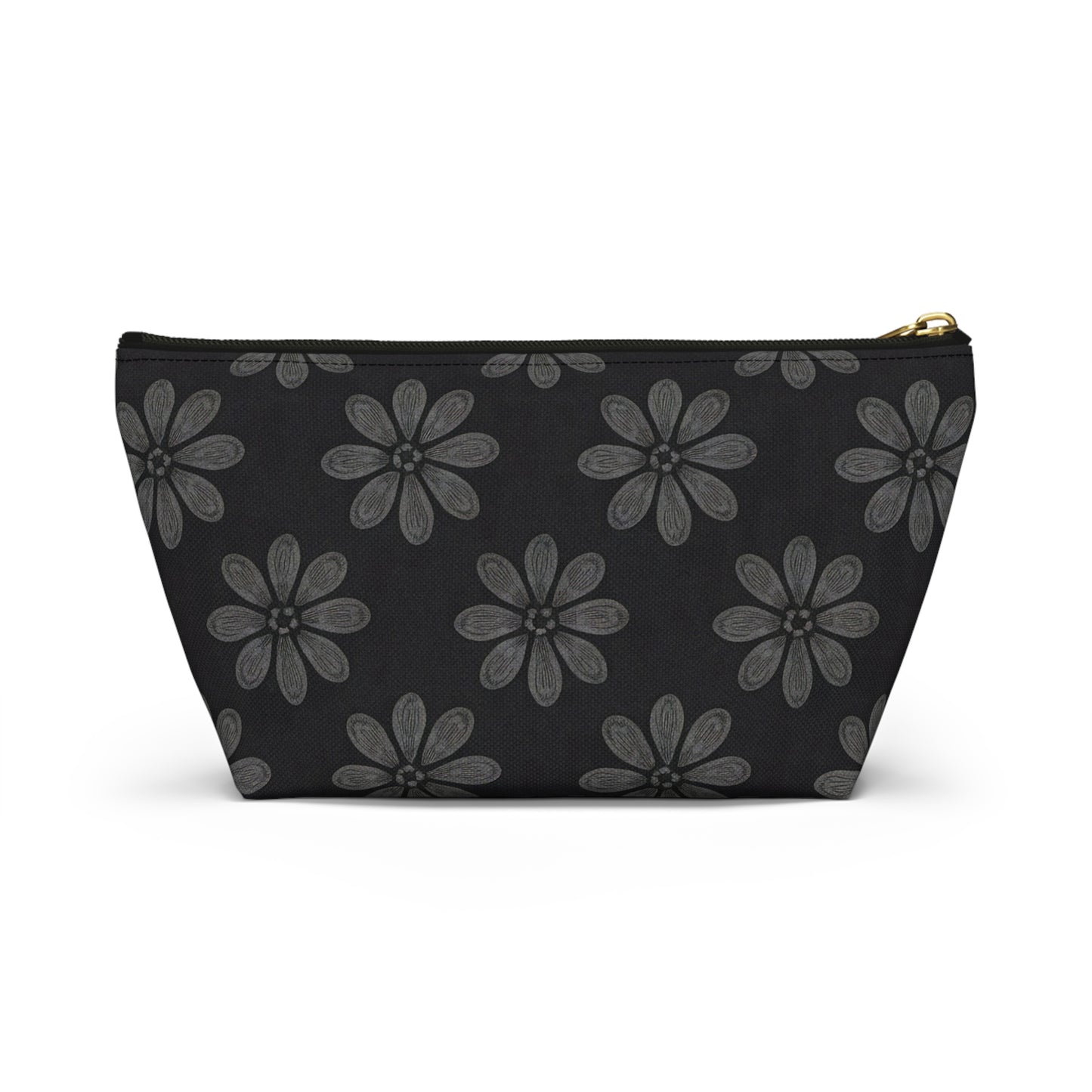 A black T-bottom pouch featuring a repeating pattern of large, stylized gray flowers with six textured petals and dotted centers. The gold zipper and wide base make it a chic cosmetic travel bag with subtle African-inspired patterns.