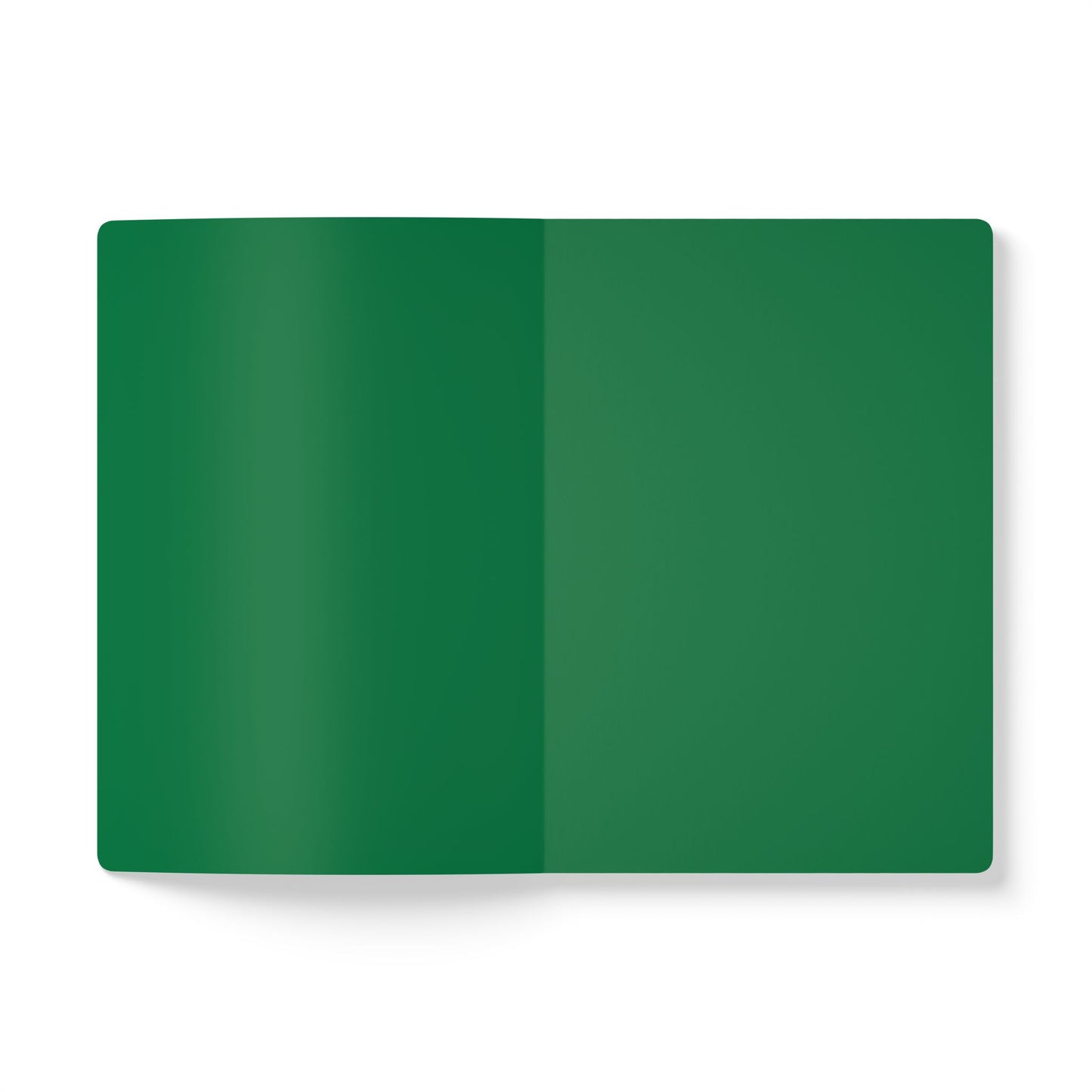 An open African-inspired journal lies flat on a white surface, displaying two blank, solid green pages with no writing, lines, or designs. The notebook appears to have rounded corners and a smooth texture, perfect for creative journaling.