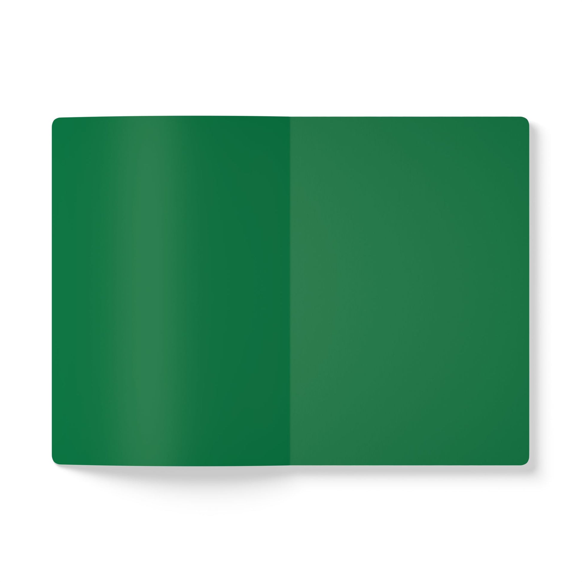 An open African-inspired journal lies flat on a white surface, displaying two blank, solid green pages with no writing, lines, or designs. The notebook appears to have rounded corners and a smooth texture, perfect for creative journaling.
