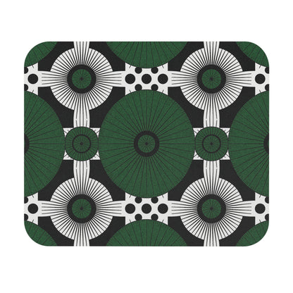 A geometric pattern with large green circles radiating lines, white shapes with black lines, and clusters of black dots on a black backdrop—this African-inspired mouse pad is a durable desk accessory with striking, symmetrical designs.