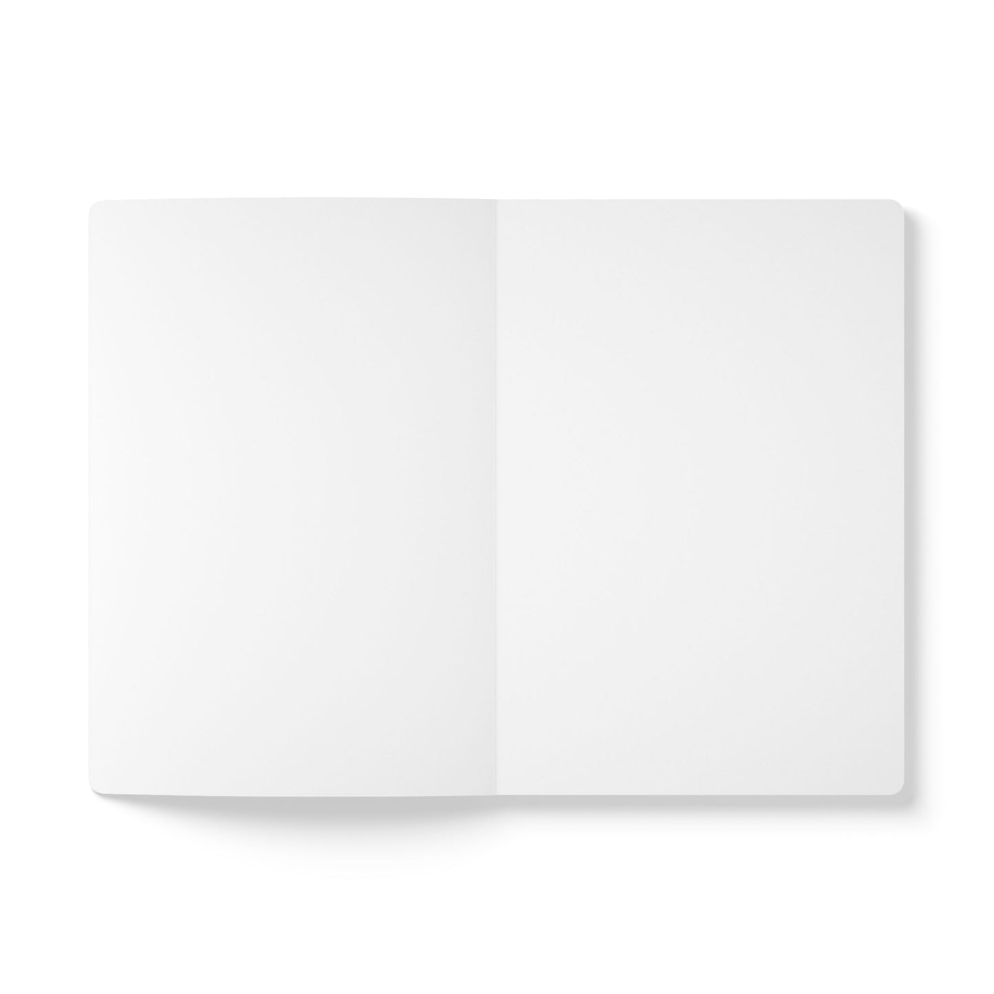 An open blank notebook, perfect for daily journaling or as a creative journal, is laid flat on a white surface. Both pages are empty, with soft shadows along the left edge, highlighting its clean, minimal, and uncluttered appearance.