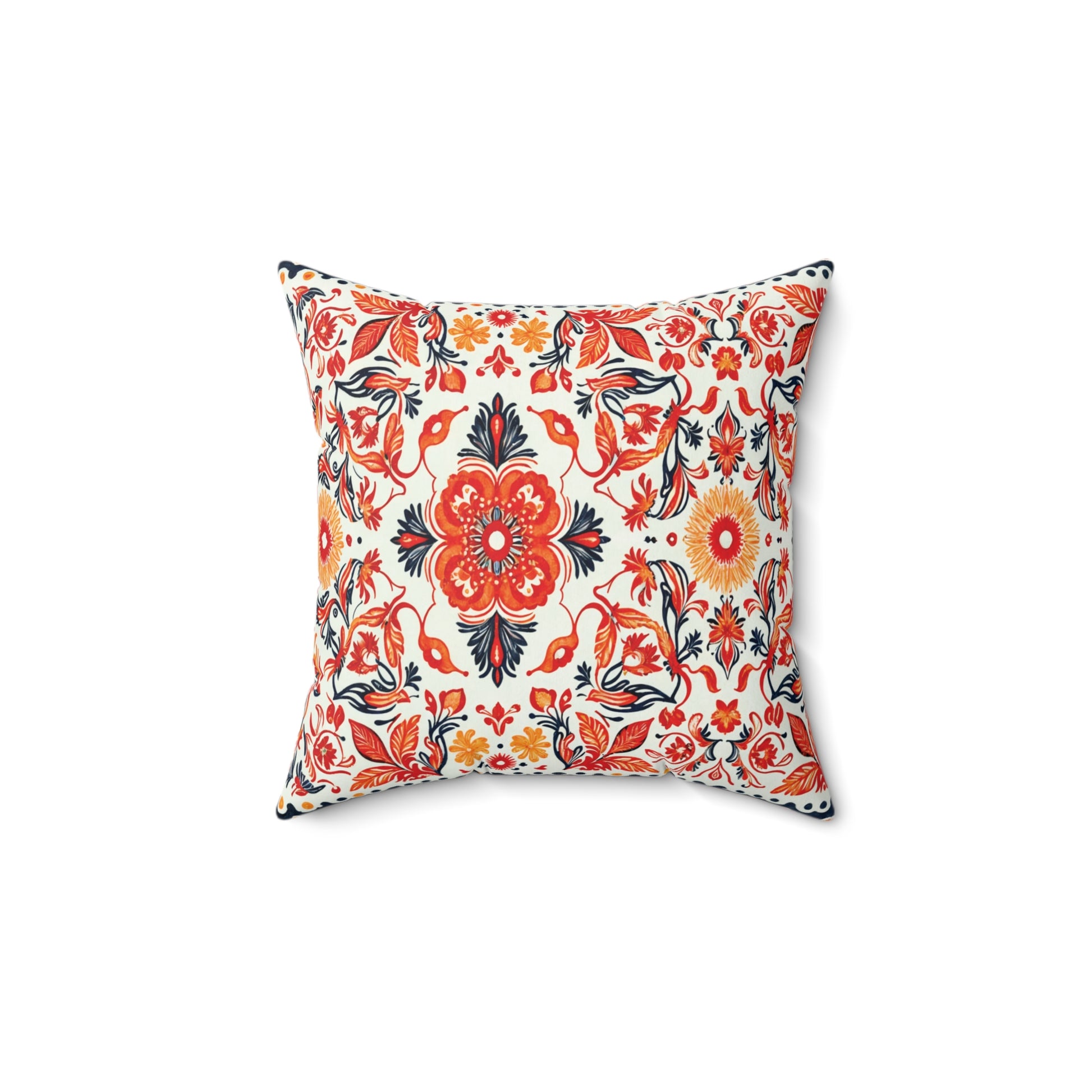 Square decorative pillow featuring a vibrant, symmetrical floral pattern in red, orange, yellow, and navy blue on white. This faux suede pillow includes large central flowers and leafy vines, bringing an ornate touch as a unique African accent pillow.