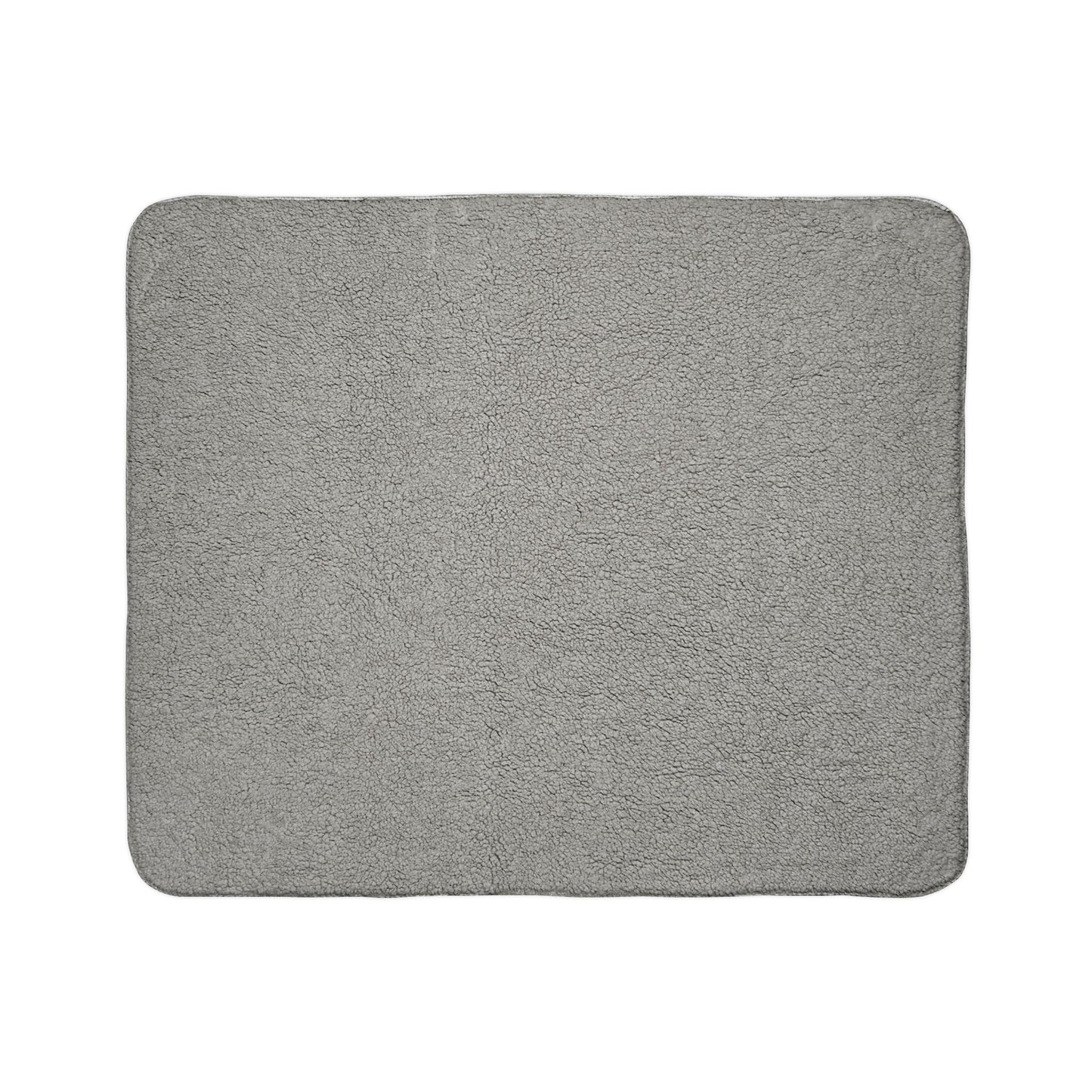 A rectangular, light gray bath mat with rounded corners. The soft, fluffy surface resembles sherpa fleece, adding plush comfort to your home decor. Photographed against a plain white background, its absorbent texture and simple design stand out.