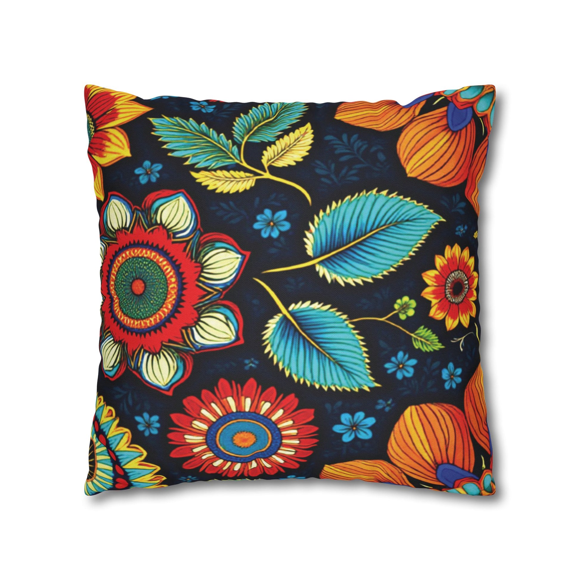 A square throw pillow with a bold, colorful floral pattern on a dark background. The design features large, intricate flowers inspired by African motifs, with green and blue leaves and small blue accent flowers scattered throughout.