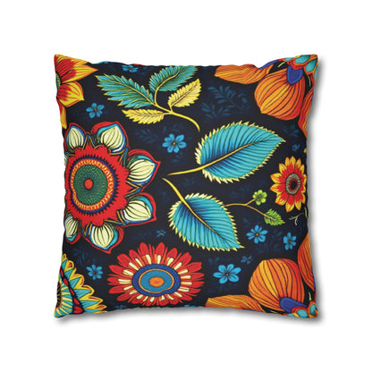 A square throw pillow with a bold, colorful floral pattern on a dark background. The design features large, intricate flowers inspired by African motifs, with green and blue leaves and small blue accent flowers scattered throughout.