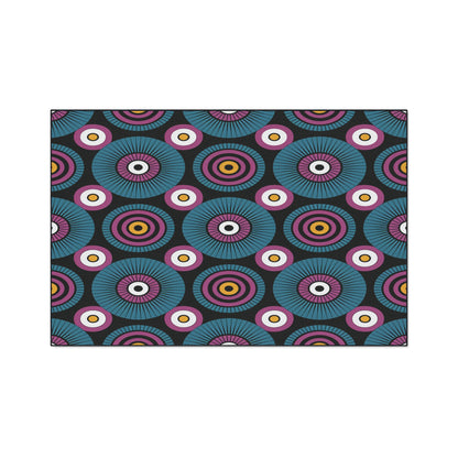 A seamless geometric pattern features concentric circles in teal, purple, pink, and orange on a dark background. The design’s retro, optical illusion style is perfect for custom floor mats with non-slip rubber backing.