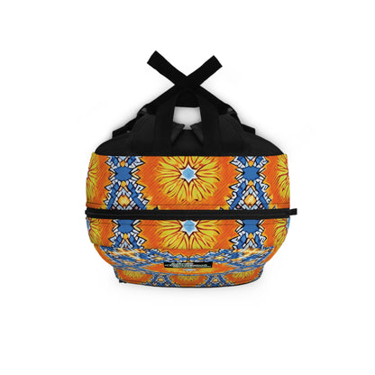 A duffel bag with black handles and a vibrant, symmetrical pattern. The design features large yellow-orange floral shapes and blue-white geometric accents, inspired by African vibrant designs, set against a bright background wrapping the bag.