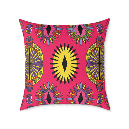 Square pillow with a bright pink background featuring African-inspired, abstract sunburst and turtle-like patterns in yellow, black, purple, green, and red—a colorful accent pillow perfect for vibrant home decor.
