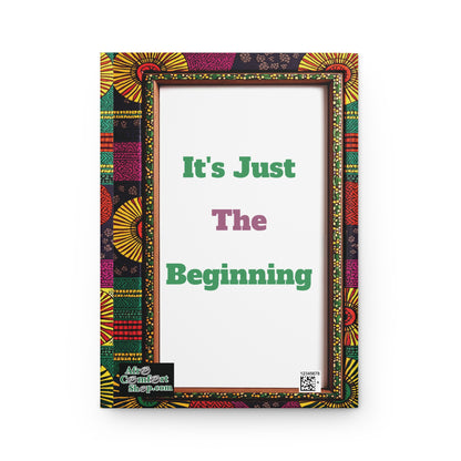 A colorful African-inspired hardcover journal frame surrounds a white space with the words Its Just The Beginning in green and purple. A small label at the bottom left corner reads Add Content Shop.com, with a QR code beside it.