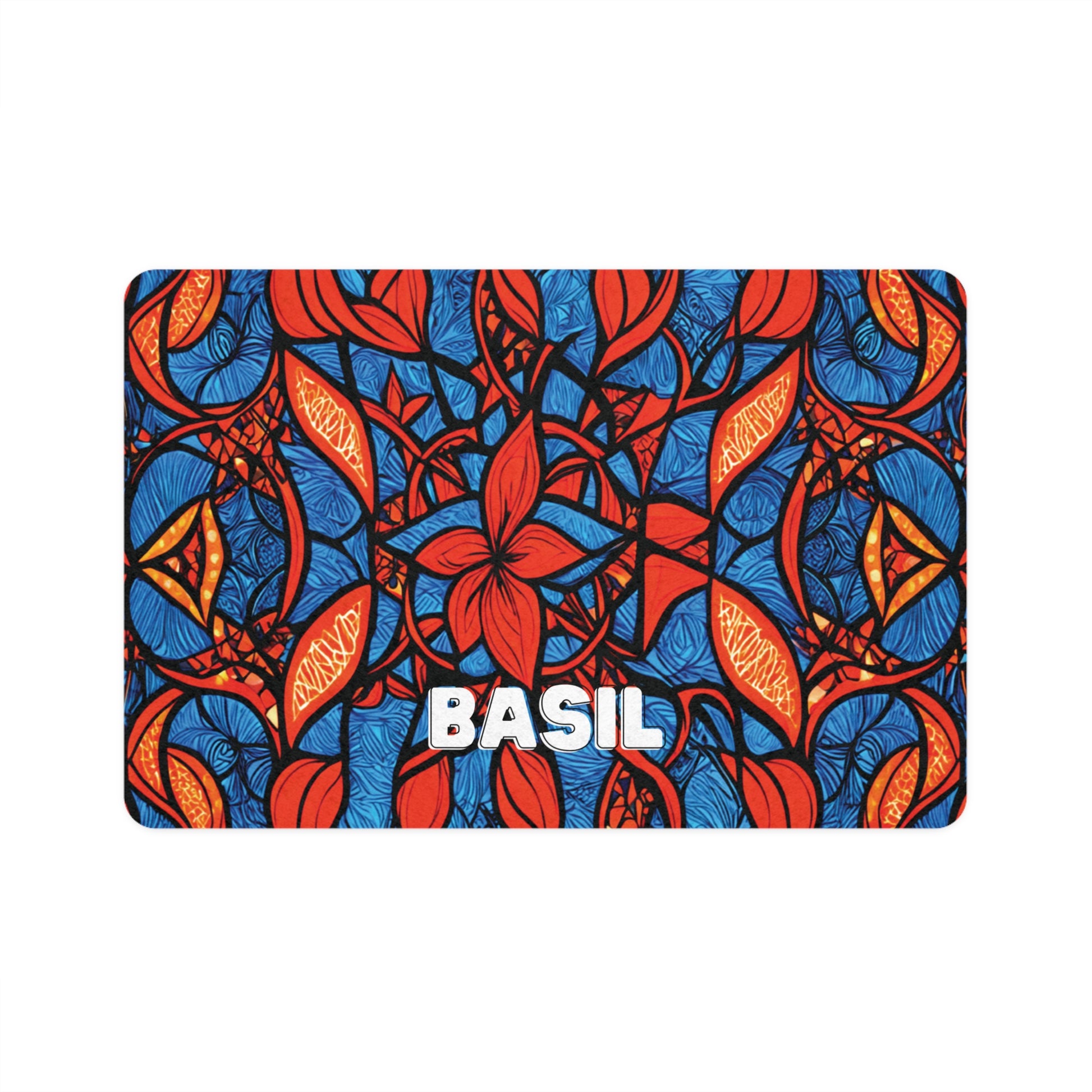 A vibrant, symmetrical, African-inspired pattern featuring red and orange basil leaves with bold blue stems and background swirls. The word BASIL appears in large white letters at the bottom center of the colorful design.