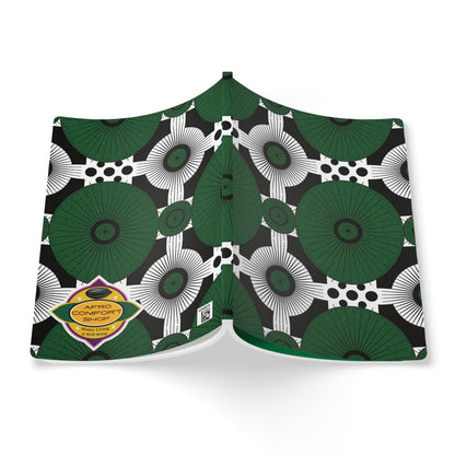 A pair of green and black men's briefs features a bold geometric pattern inspired by African-inspired journal designs. The yellow Afro Comfort sticker accents the left side, and the solid green waistband stands out against the plain white background.