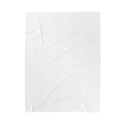 A plain white sheet of fabric is shown against a white background. The subtle creases and wrinkles create gentle shadows and texture, making it a perfect base for designing a personalized velveteen blanket or thoughtful custom gift.