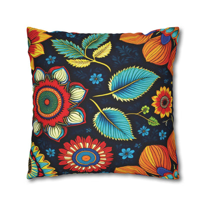 Square pillow with a bold, colorful floral pattern on a black background. Reminiscent of African patterns, the large red, yellow, orange, and blue flowers with vibrant leaves create an eye-catching design perfect for vibrant pillowcases.