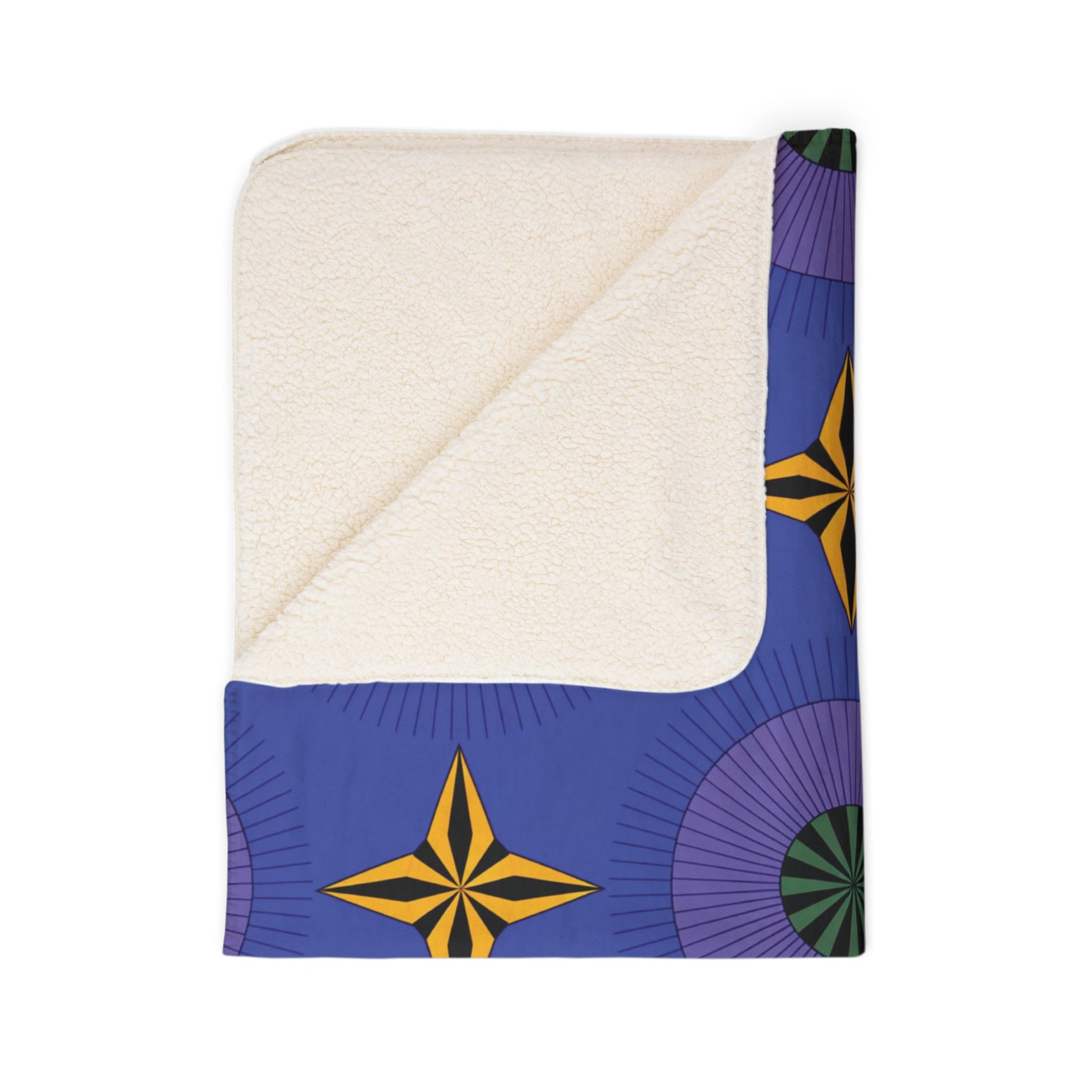 A folded sherpa fleece blanket with a cream-colored, soft sherpa underside and a visible corner flipped over. The blue top side features yellow star shapes and circular purple and green geometric patterns—perfect for cozy home decor.