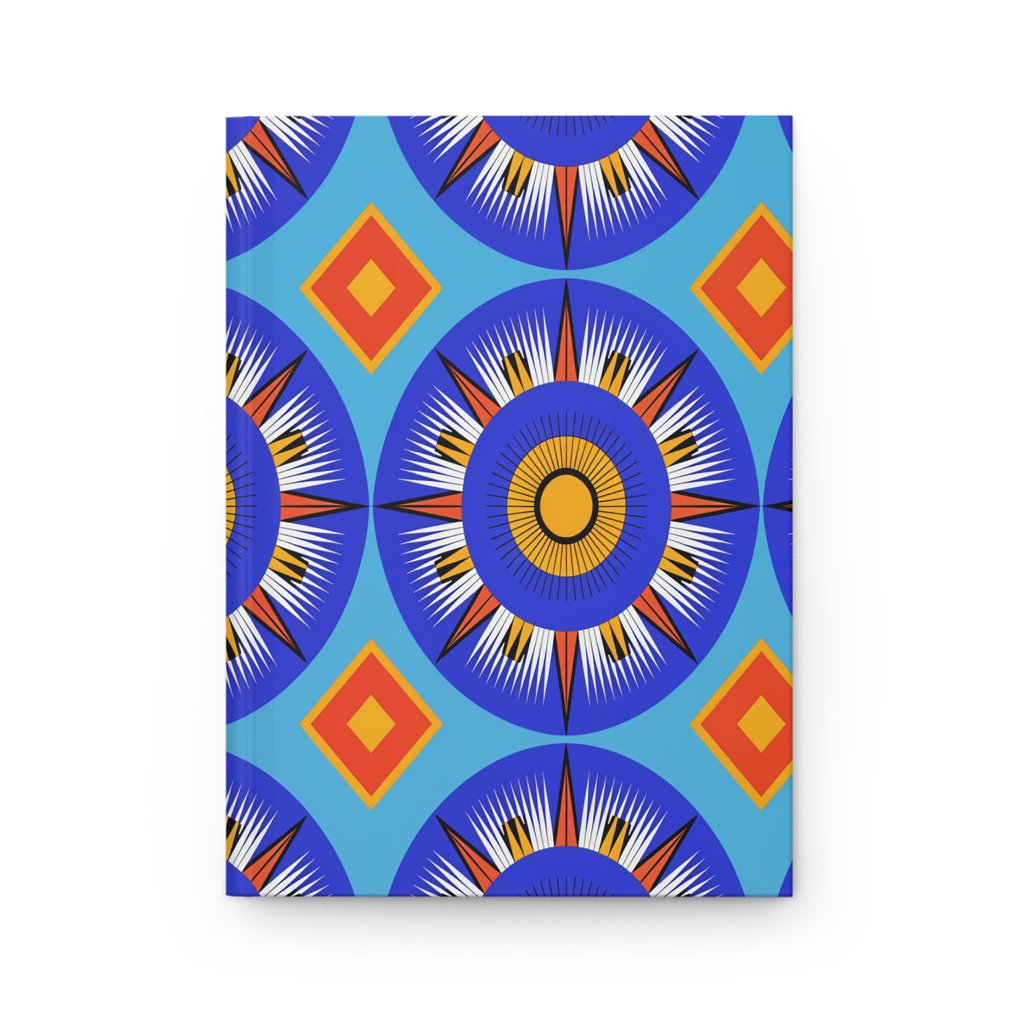 A vibrant geometric pattern featuring large blue circular sunburst shapes with white, black, and yellow rays adorns this African-inspired journal. Orange and yellow diamond shapes on a light blue background create a striking, symmetrical design.