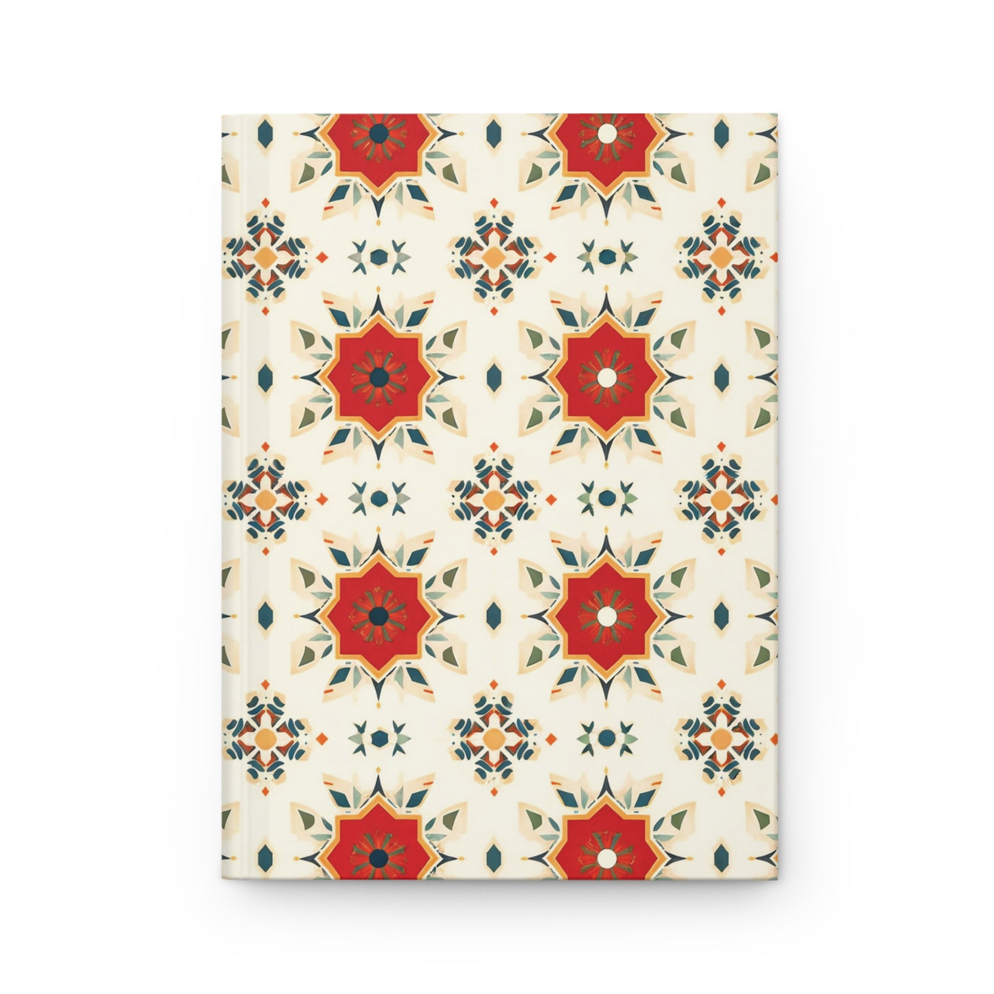 A hardcover wellness journal featuring a repeating geometric pattern of red and gold star shapes, accented with green and dark blue details on a cream background. The ornate, symmetrical design adds a decorative touch to your daily reflections.