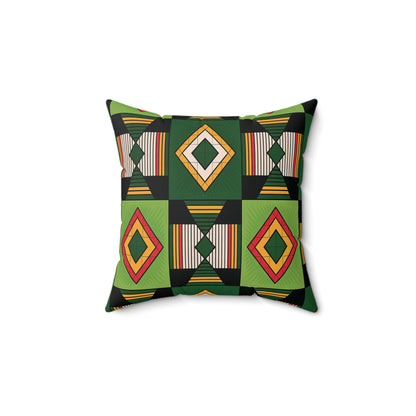 Square green and black throw pillow with a geometric pattern of diamonds and triangles in green, yellow, red, and black, accented by vertical stripes. The African inspired accent pillow pops against a white background for a bold look.