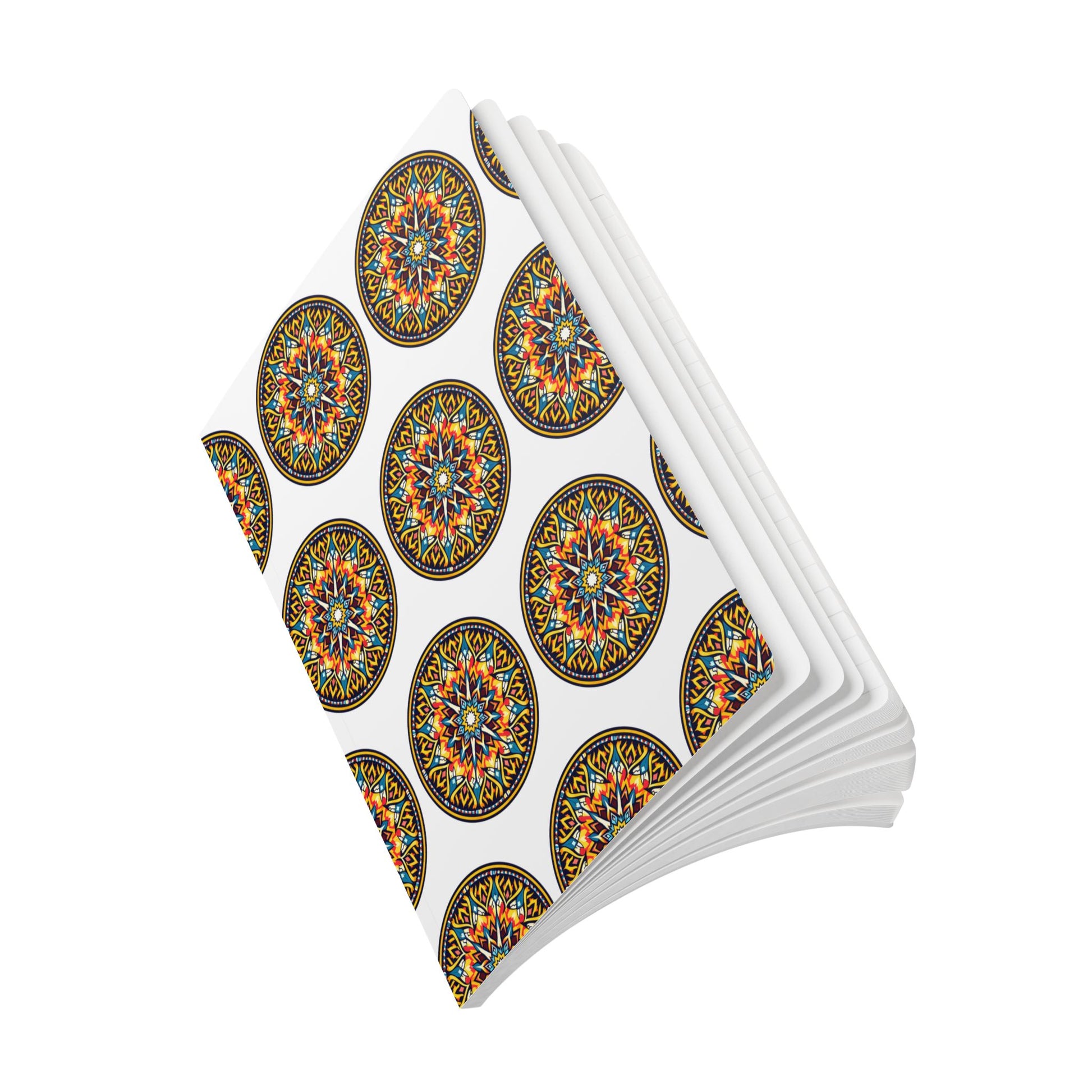 Five white napkins are stacked and slightly fanned out, each featuring vibrant, mandala-like designs reminiscent of an African-inspired journal, with intricate geometric shapes and bright hues of orange, blue, yellow, and green.