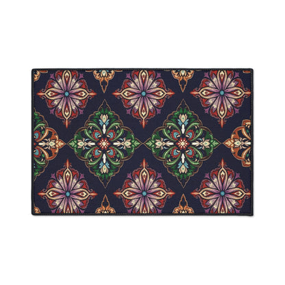 Rectangular non-slip rug with a repeating ornate floral pattern in red, orange, green, and cream on a dark navy background. Symmetrical flower and leaf motifs in diamond shapes create a luxurious, vintage, and richly decorative look.