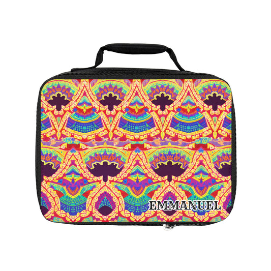 A rectangular, African-inspired lunch tote with a black zipper and handle, featuring a vibrant geometric pattern in yellow, red, blue, and purple. The insulated lunch bag is personalized with “EMMANUEL” in bold white letters at the bottom right corner.