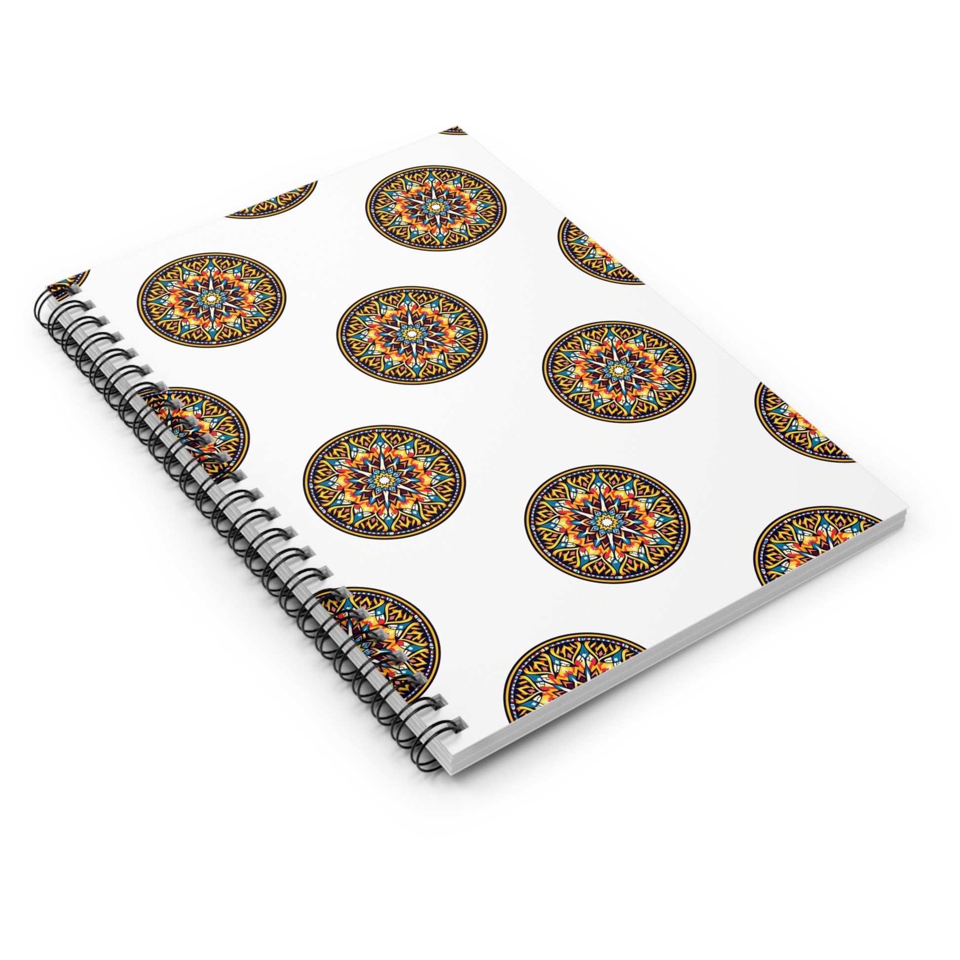 A spiral-bound notebook with a white cover, adorned with colorful mandala designs featuring intricate geometric patterns in orange, blue, black, and yellow. This African-inspired spiral notebook offers a premium writing experience on a crisp white background.