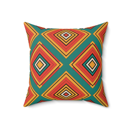 Square pillow with a bold geometric design in red, orange, yellow, and dark teal. The vibrant pattern features large diamond shapes bordered by yellow, creating a unique decor accent inspired by African-Inspired pillows. The background is white.