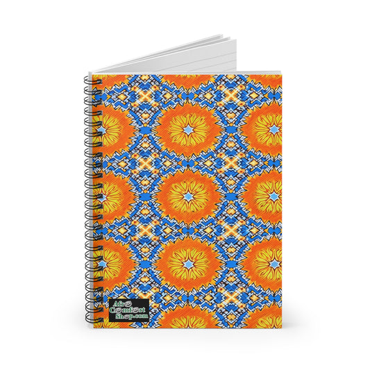 A vibrant notebook with a spiral binding and an intricate geometric pattern in orange, yellow, and blue. The African-inspired spiral notebook’s cover features stylized flowers or sunbursts and a small black label reading “Abie’s Confident Shop...ar.”.