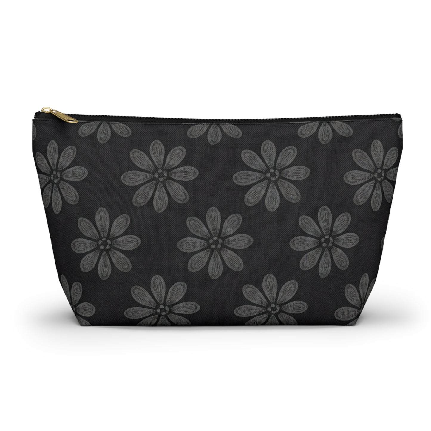 A black T-bottom pouch with a gold zipper, featuring African-inspired patterns of large, stylized gray flowers with petal details evenly spaced across the surface. This cosmetic travel bag is photographed against a white background.