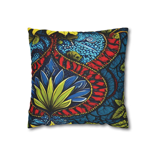 Square decorative pillow with vibrant African patterns in bold red, blue, yellow, and green. A stylized leaf motif and swirling shapes stand out on a dark background. This eye-catching piece is perfect for those seeking unique African pillowcases.
