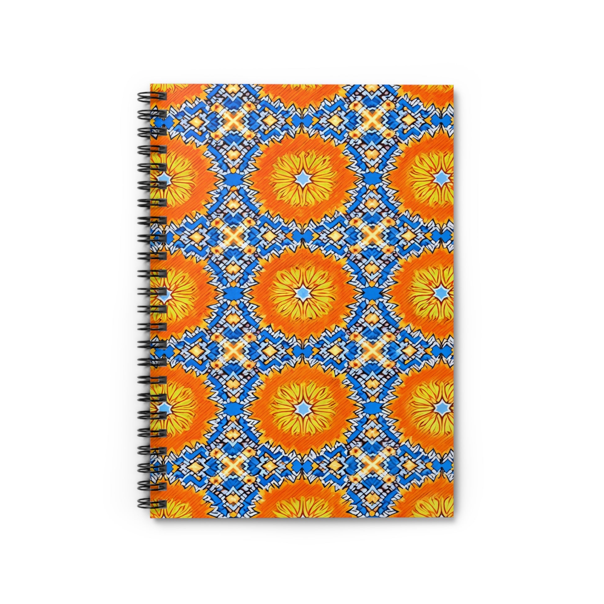 A spiral-bound African-inspired spiral notebook with a vibrant cover features a repeating geometric pattern of large orange and yellow sunburst shapes. Bold blue, white, and yellow diamond designs add a culturally inspired touch to this premium writing experience.