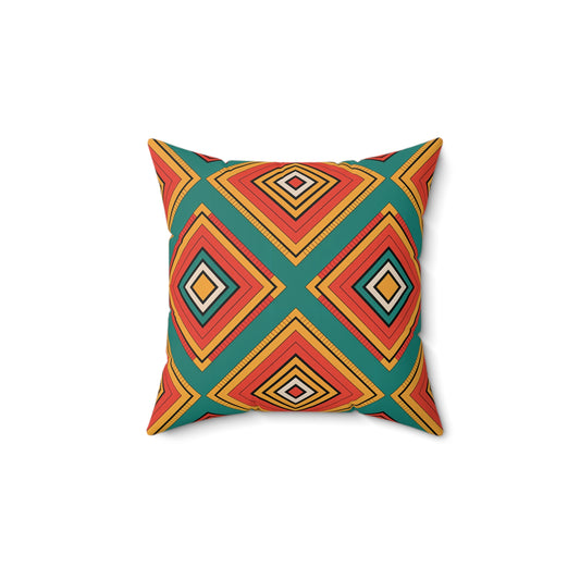 A square pillow with a bold geometric pattern featuring overlapping diamond shapes in red, orange, yellow, and black on teal. Inspired by vibrant patterns, this unique decor piece stands out against a crisp white background.
