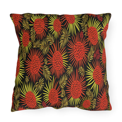 A square pillow featuring a bold, African-inspired tropical pattern with large red and yellow sunburst-like floral shapes and leafy accents on a black background. The vibrant design gives the pillow an energetic and exotic appearance.