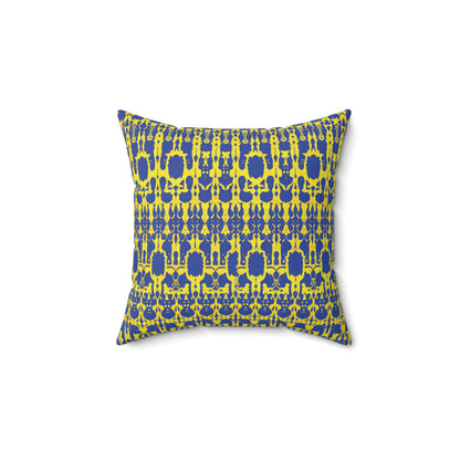 A square faux suede pillow with a vibrant yellow and blue symmetrical pattern. The design features repeating abstract shapes and motifs, creating a bold and modern African inspired accent pillow centered on a white background.
