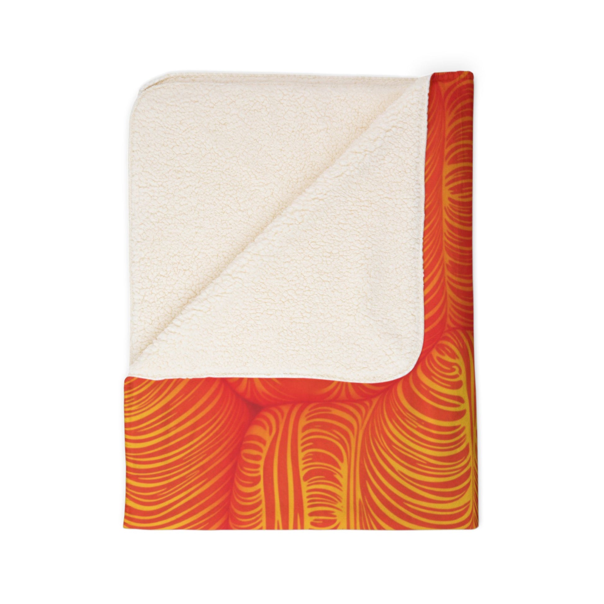 A rectangular sherpa fleece blanket with a white, fluffy lining on one side, partially folded to reveal a vibrant red, orange, and yellow abstract swirl. This cozy home decor piece is displayed on a plain white background.