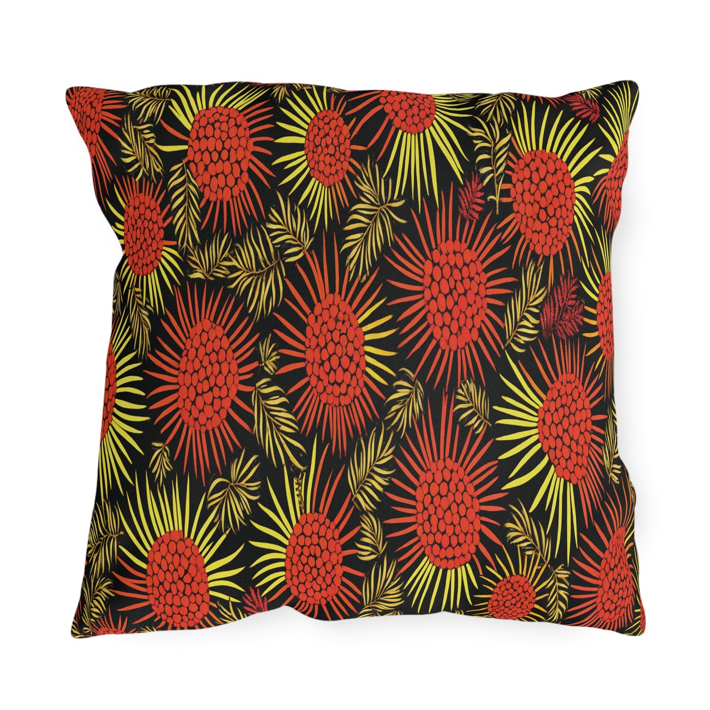 A rectangular pillow with a black background features a bold, African-inspired pattern of red and orange pinecone-like shapes and yellow radiating lines, accented by leafy green fronds for a vibrant, tropical design.